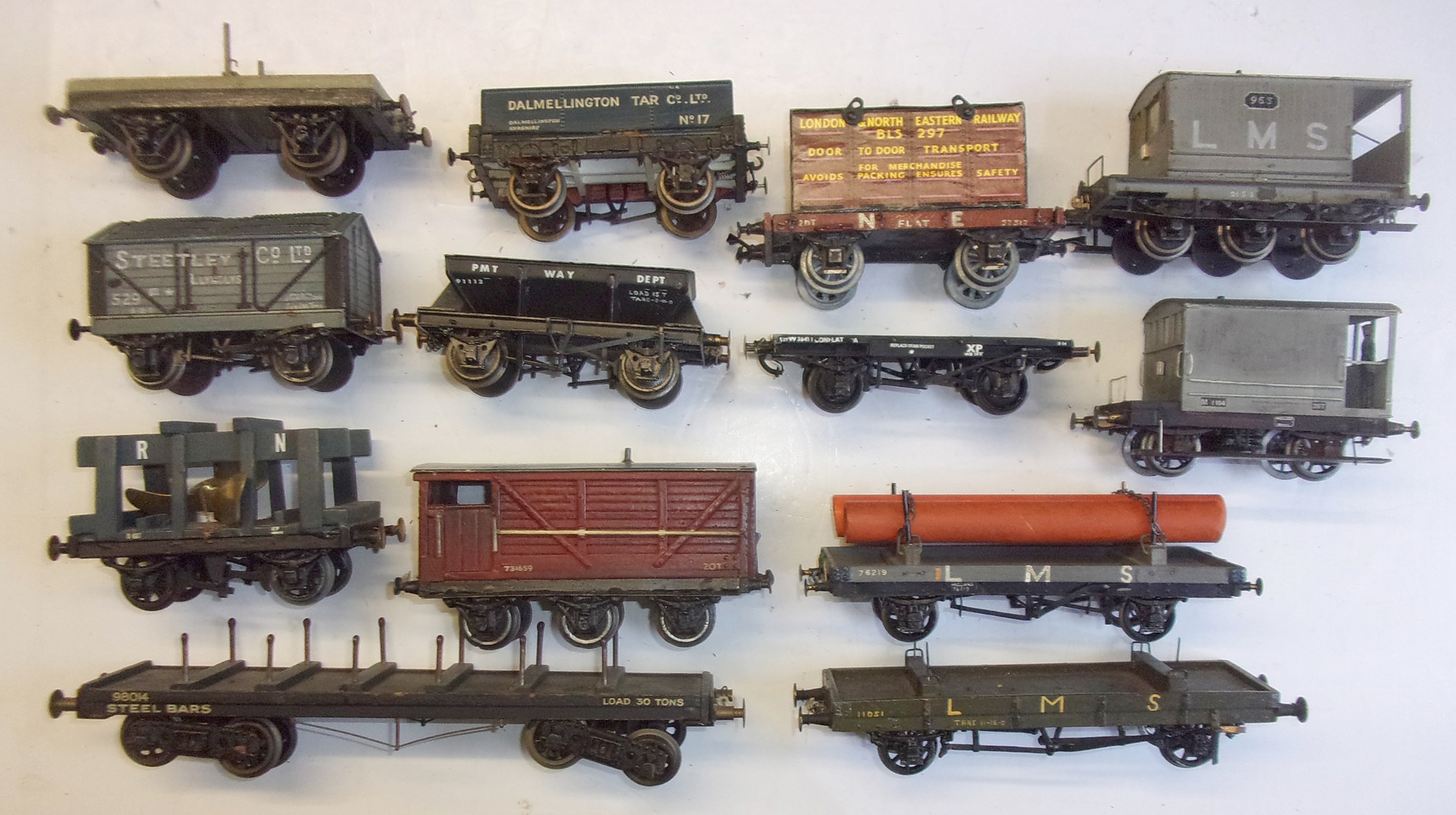 13 x O GAUGE 3 RAIL, assorted wagons, various makes, quite an array of brake vans included.  Good used condition.