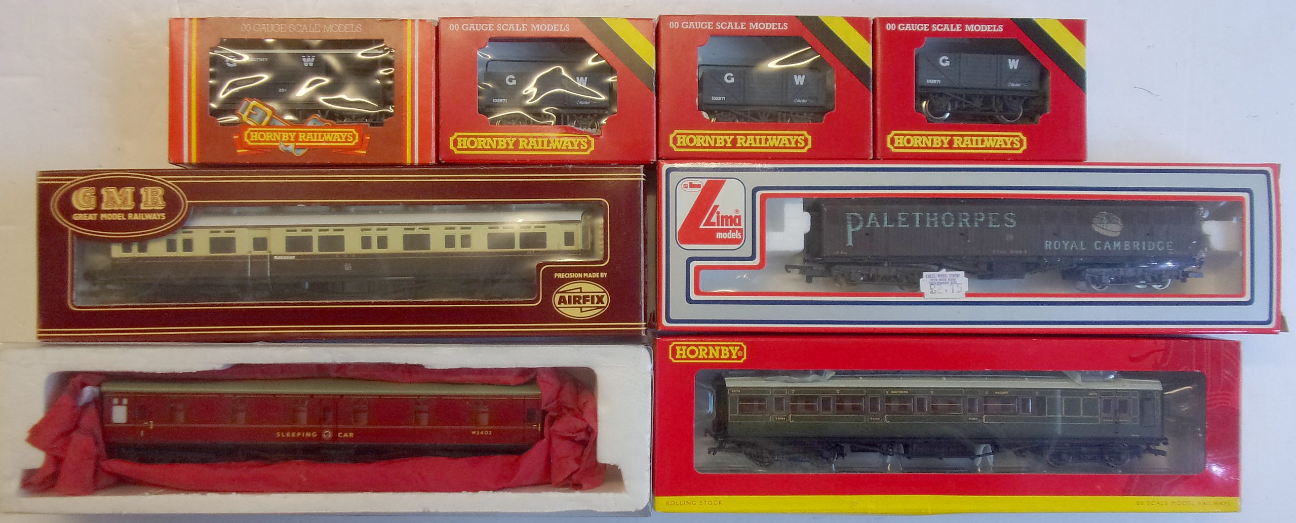 Quantity of OO boxed, unused rolling stock, various makes.