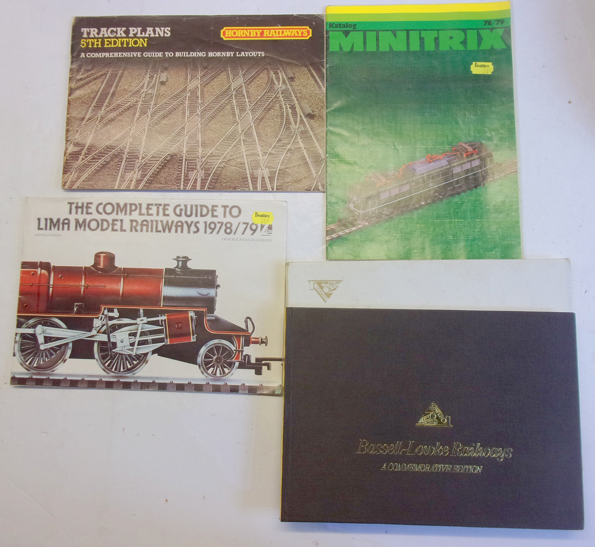 4 x OO Railway Catalogues, including A Bassett Lowke Commemorative Edition, new in sleeve.