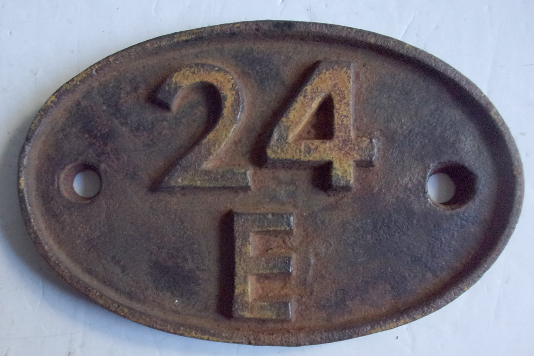 Shedplate "24E" looks like repro or just un-carried , no bolts have been through the fixing holes.