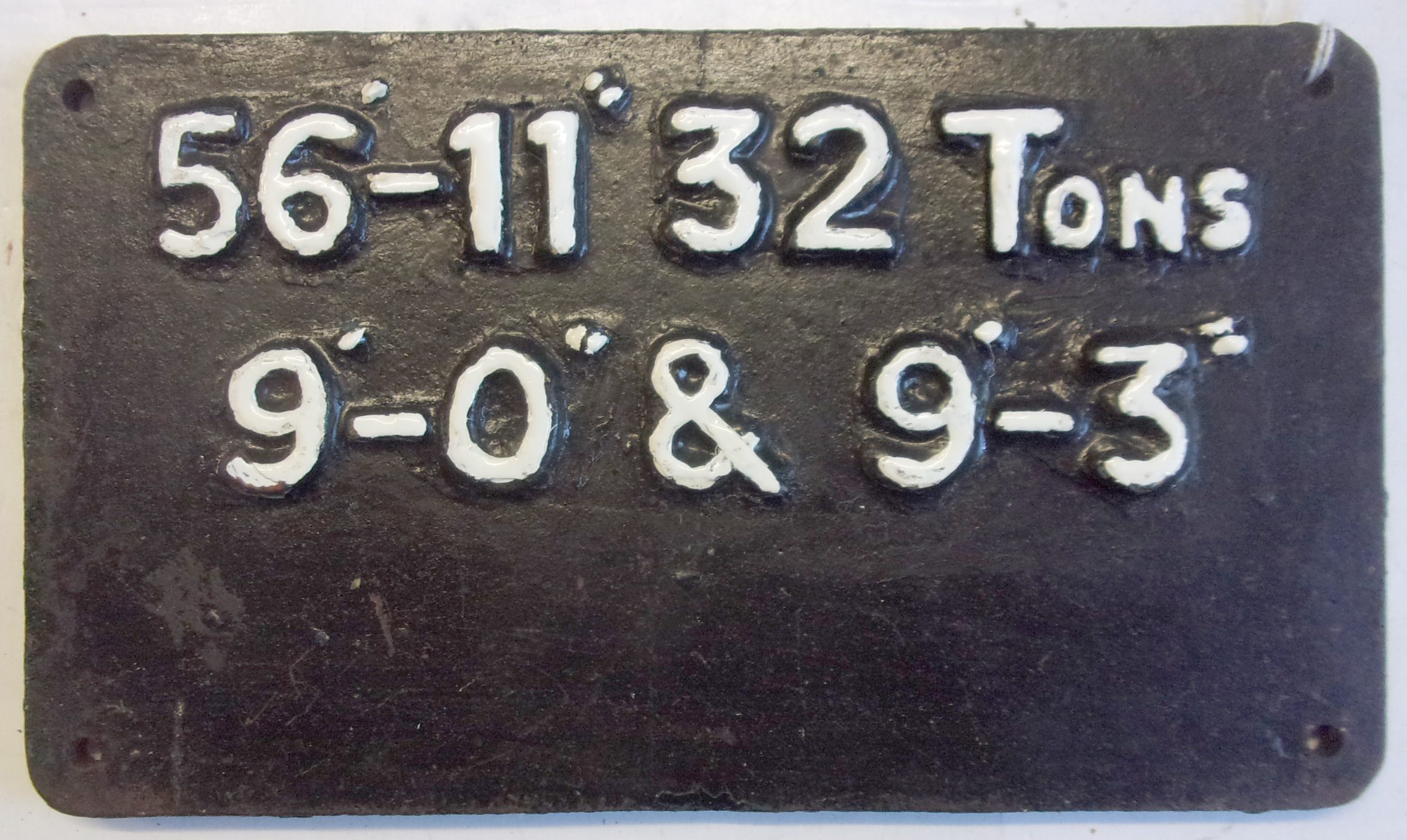 Cast iron Carriage Plate 56'-11" 32 Tons etc, as pictured.  8" x 4 1/2".