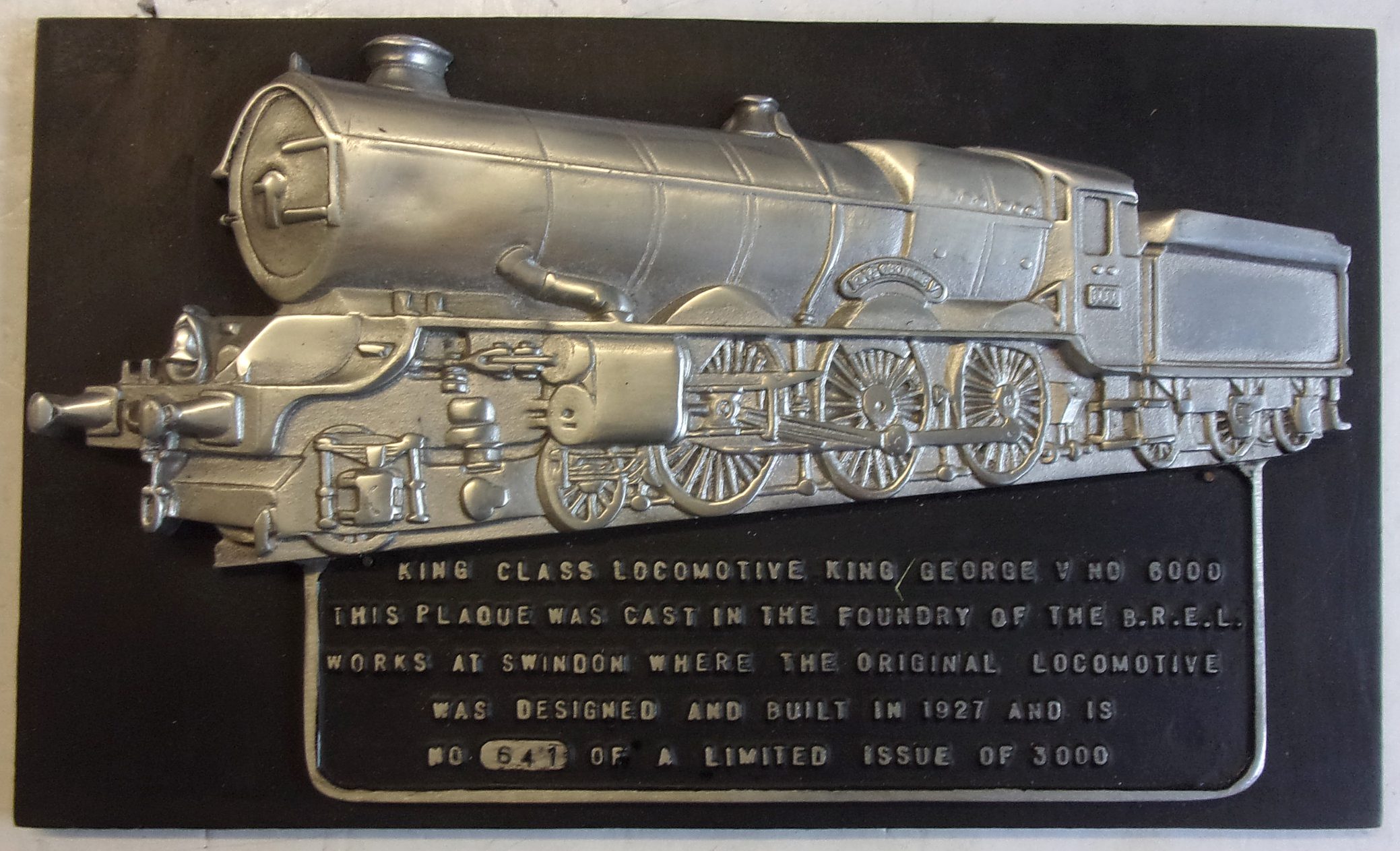 B.R.E.L Aluminium Plaque, mounted on display wooden board.  12" x 7" OD. v.g.c.