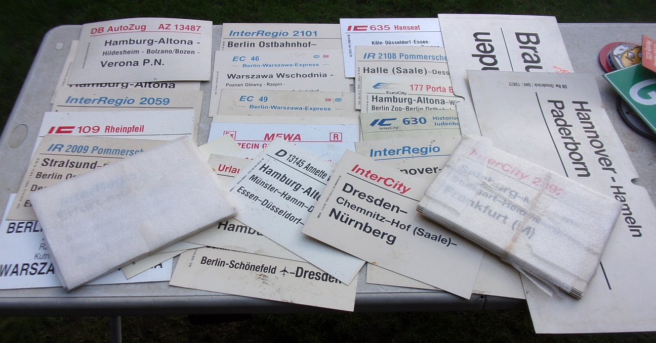 Large Quantity of German Carriage Destination Labels in plastic.  30cm x 21cm, on average and two unwrapped packs.