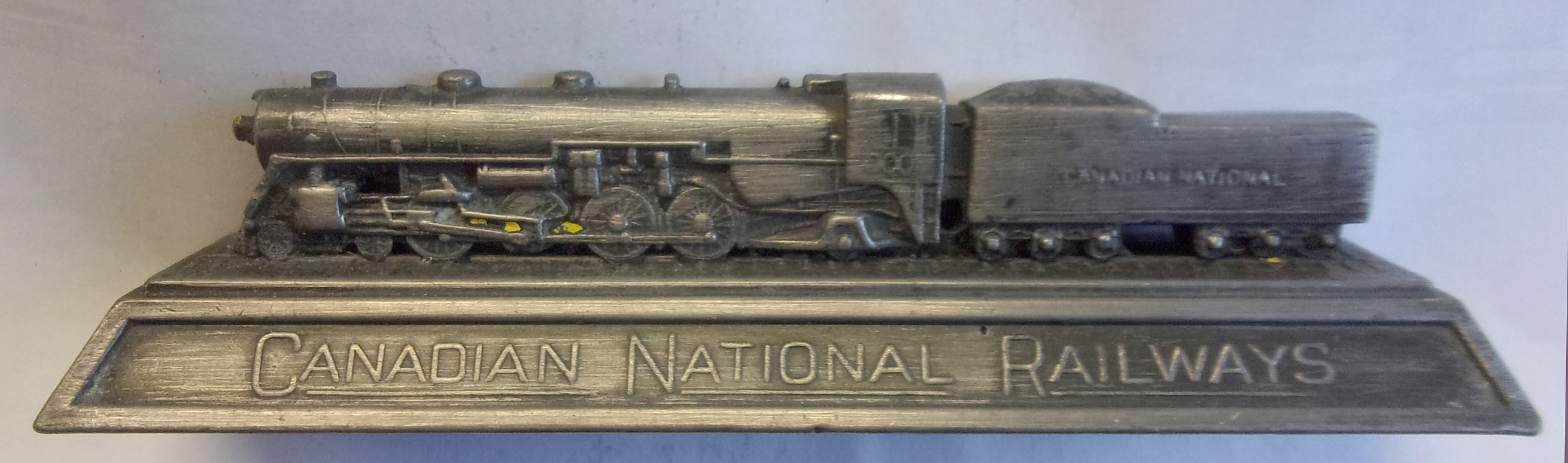 Pewter Paperweight "British Empire Exhibition London 1924.  C.N.R in v.g.c. 5 1/2" in length.  2 x images to view.