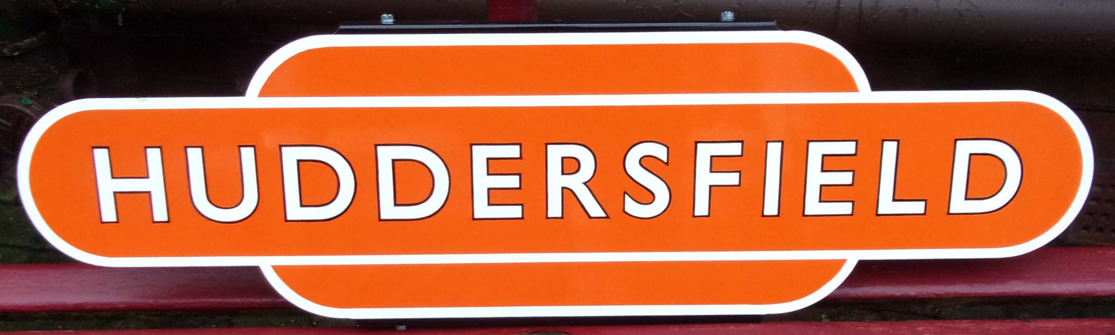 Enamel Repro Totem "Huddersfield" BR(NE) HF. Correct size, has brackets to back, as new condition. 2 x images to view.