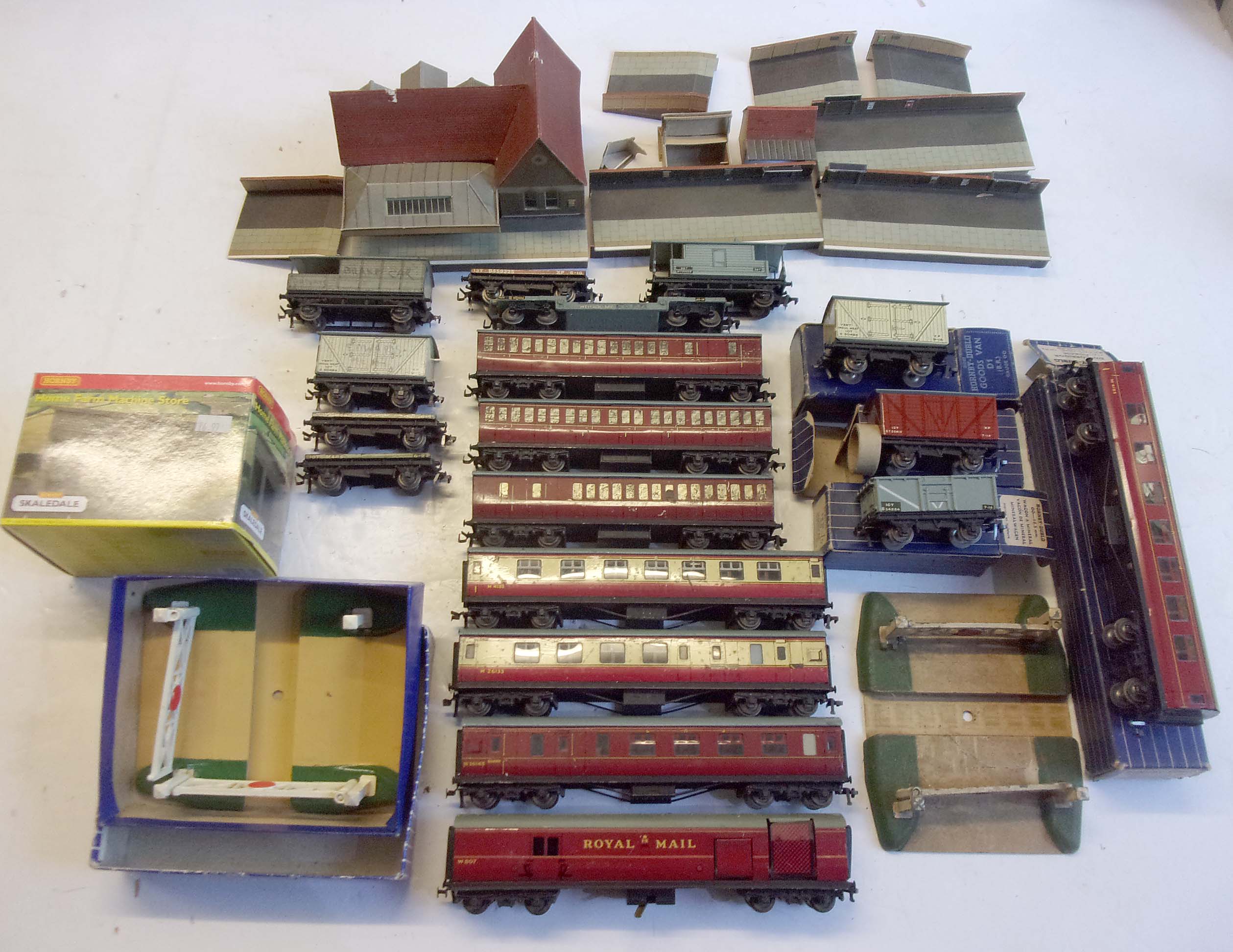 A delve of Hornby 3 Rail Rolling Stock, some boxed, plus 2 level crossings, one boxed, as new, also card built station.