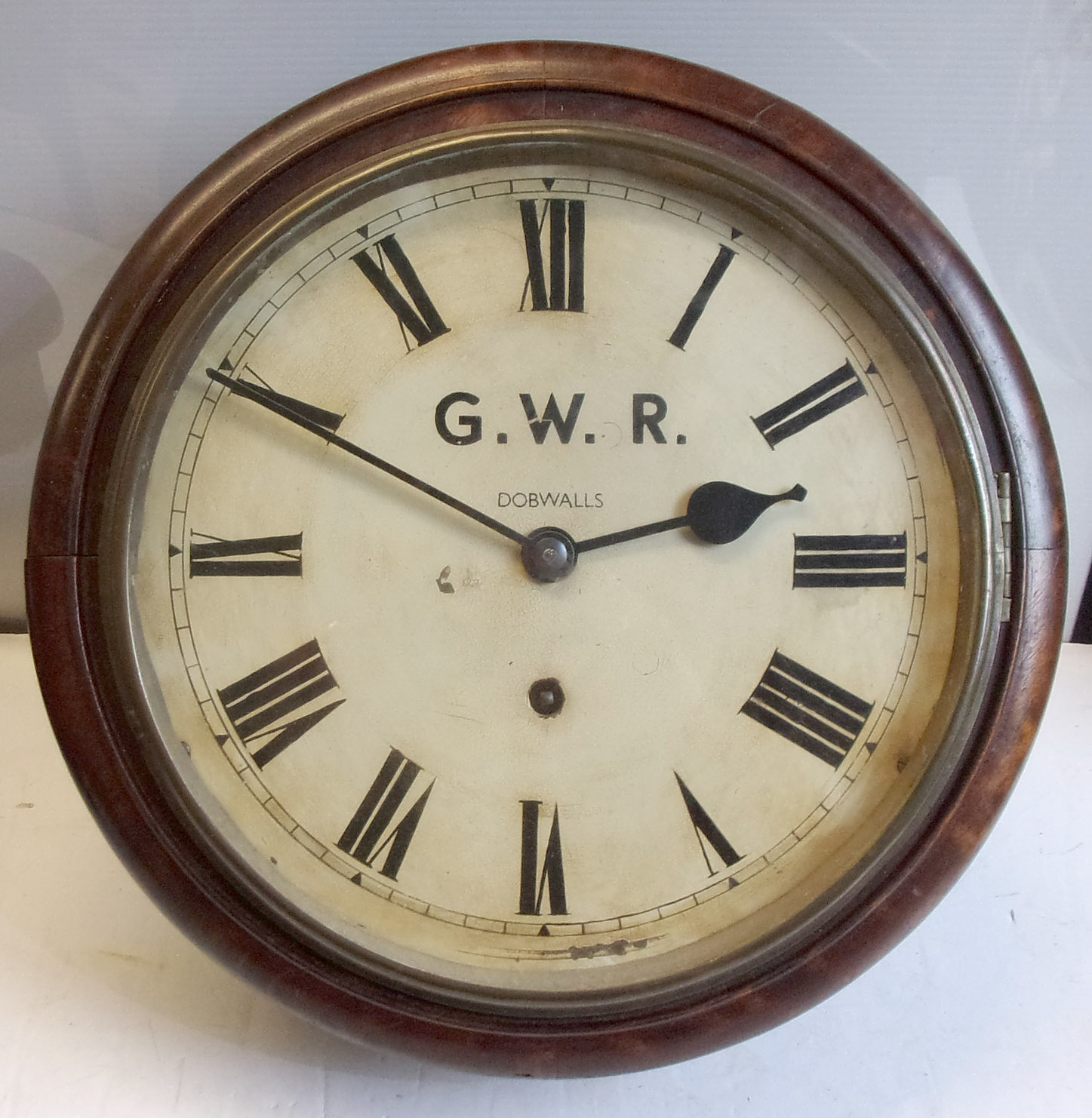 Single Fusee 10" Wall Clock, face written GWR, this looks ok but Dobwalls has been added as this was the famous miniature USA Railway at this location, sadly no more.  Complete with pendulum & key.  (4 x images to view).