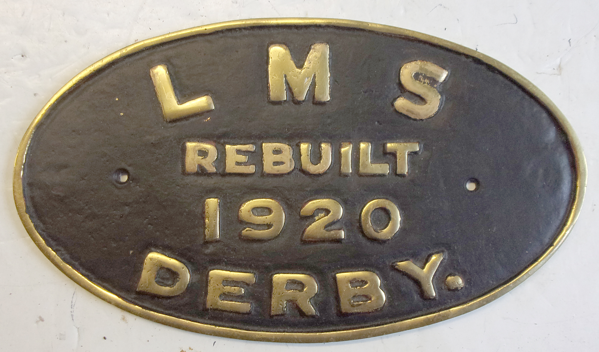 Repro Locomotive Worksplate "LMS Rebuilt Derby". Correct size. Cast brass.