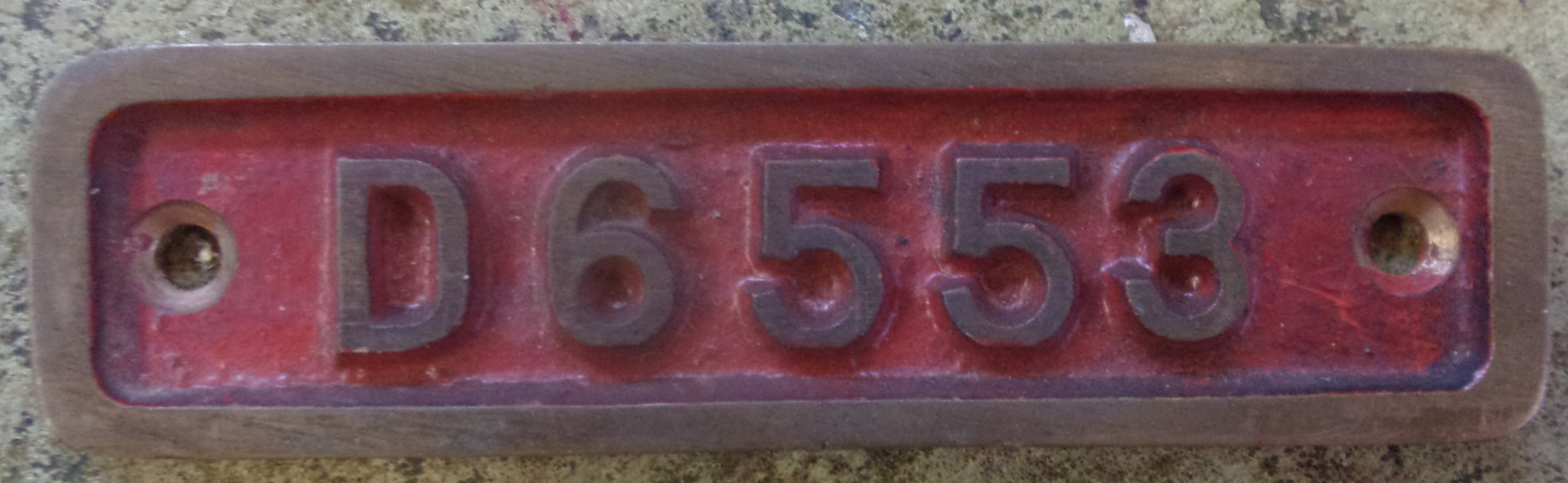 Original Class 33 Loco Cab Running No. D6553 - BR Type 3 Crompton Bo-Bo loco, built by Birmingham Railway Carriage & Wagon Co. Entering traffic between 1960-1962. 95 built in total. D6553s allocations included Hither Green, New England, Derby, Briston, Eastleigh. Withdrawn in 1996. This loco is preserved. Embossed cast brass 4' 2/10" x 1 3/16".