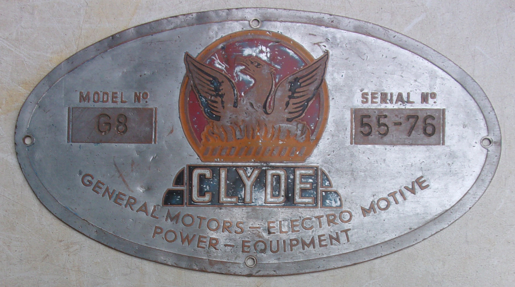 Locomotive Worksplate Modern Traction "Clyde General Motors - Electro Motive Power - Equipment Model G8, serial number 55-76", as carried by Australian Victoria Rly, diesel electric loco type "T" numbered "T326", coated brass plate. 13 1/2" x 7 1/2".
