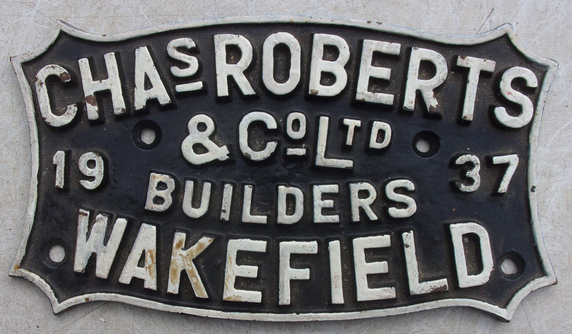 Chas Roberts Wagon Plate 1937, restored face.