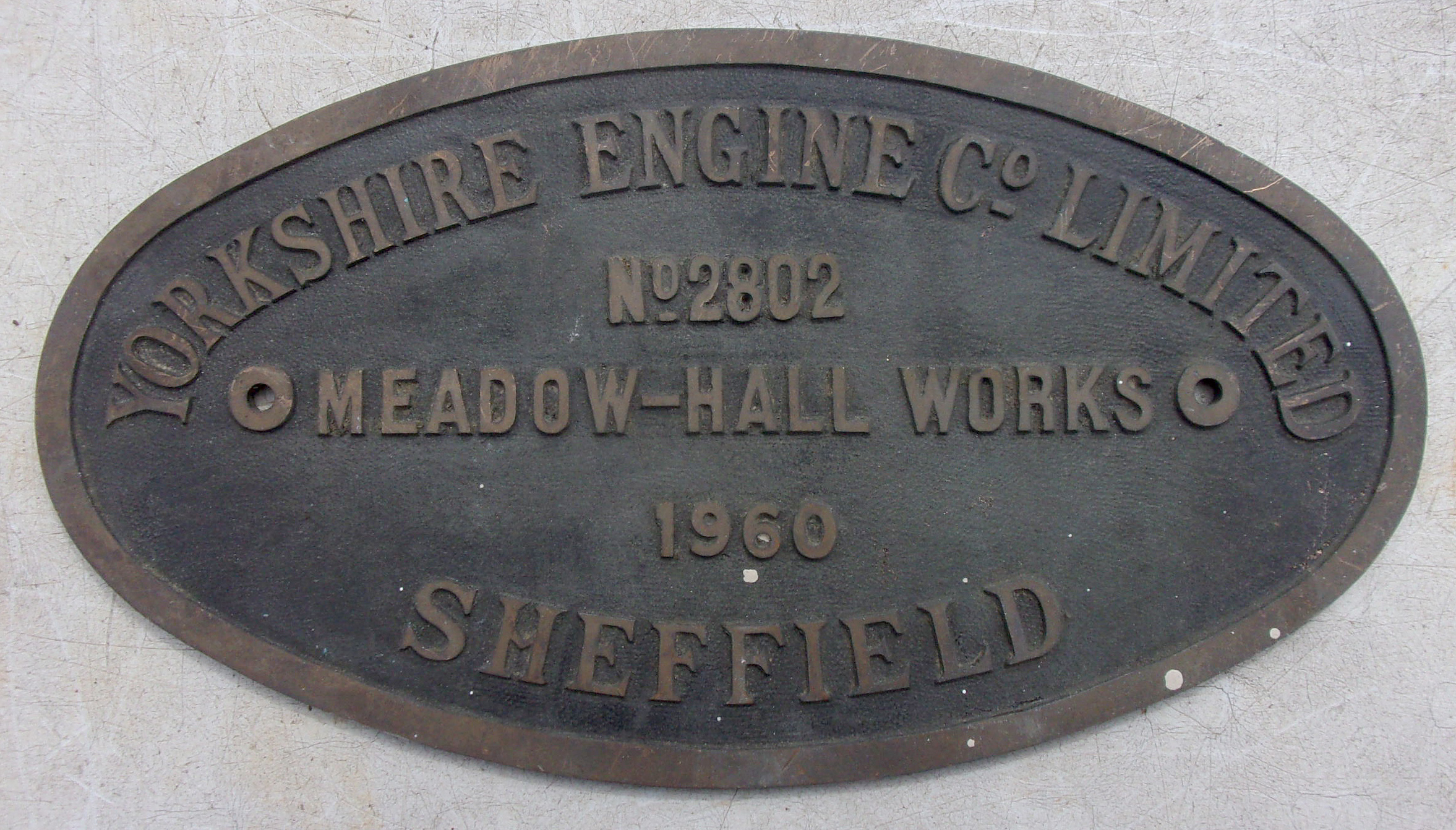 Locomotive Worksplate "Yorkshire Engine Co Ltd No. 2802 Meadowhall Works, Sheffield 1960", as carried by BR Class 02 Shunter, allocated to Bank Hall, Aintree, Speke Jc, finally Allerton Top Number 02002. Embossed cast brass. 11" x 6".