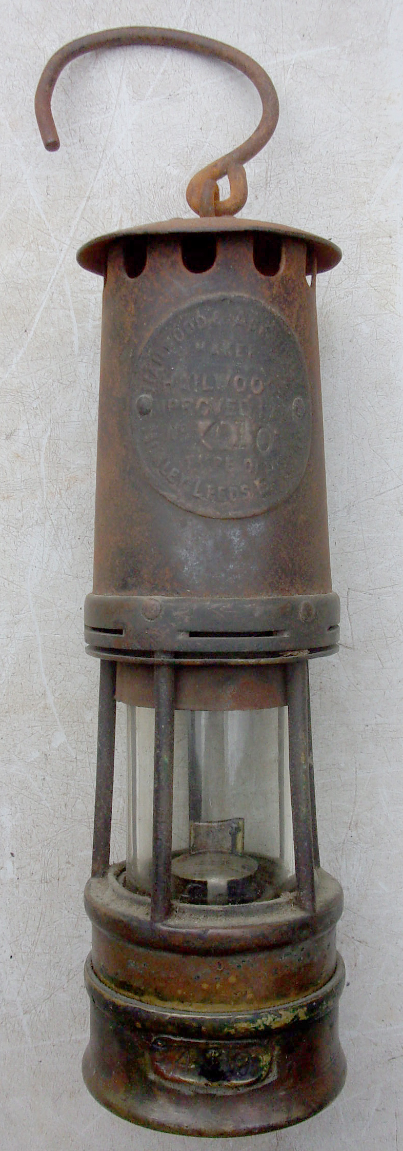 Davy Lamp by Halewood & Akroyd, No. 410 stamped to makers plate also to lozenge on the vessel. In lovely ex pit condition. If this lamp could talk!!