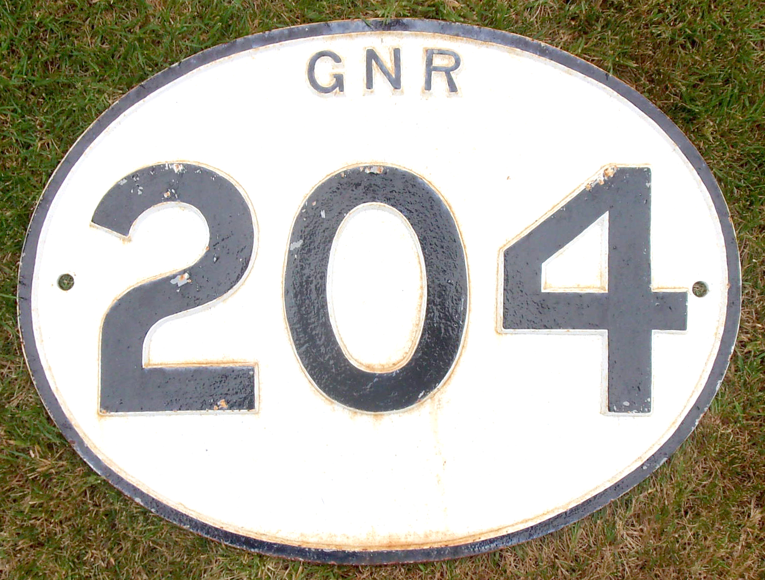 GNR Bridge Plate "GNR 204". Retrieved from the East Coast Main Line on Stoke Bank, Mallard would have thrashed past this plate on the 3rd July 1938. Sound condition.
