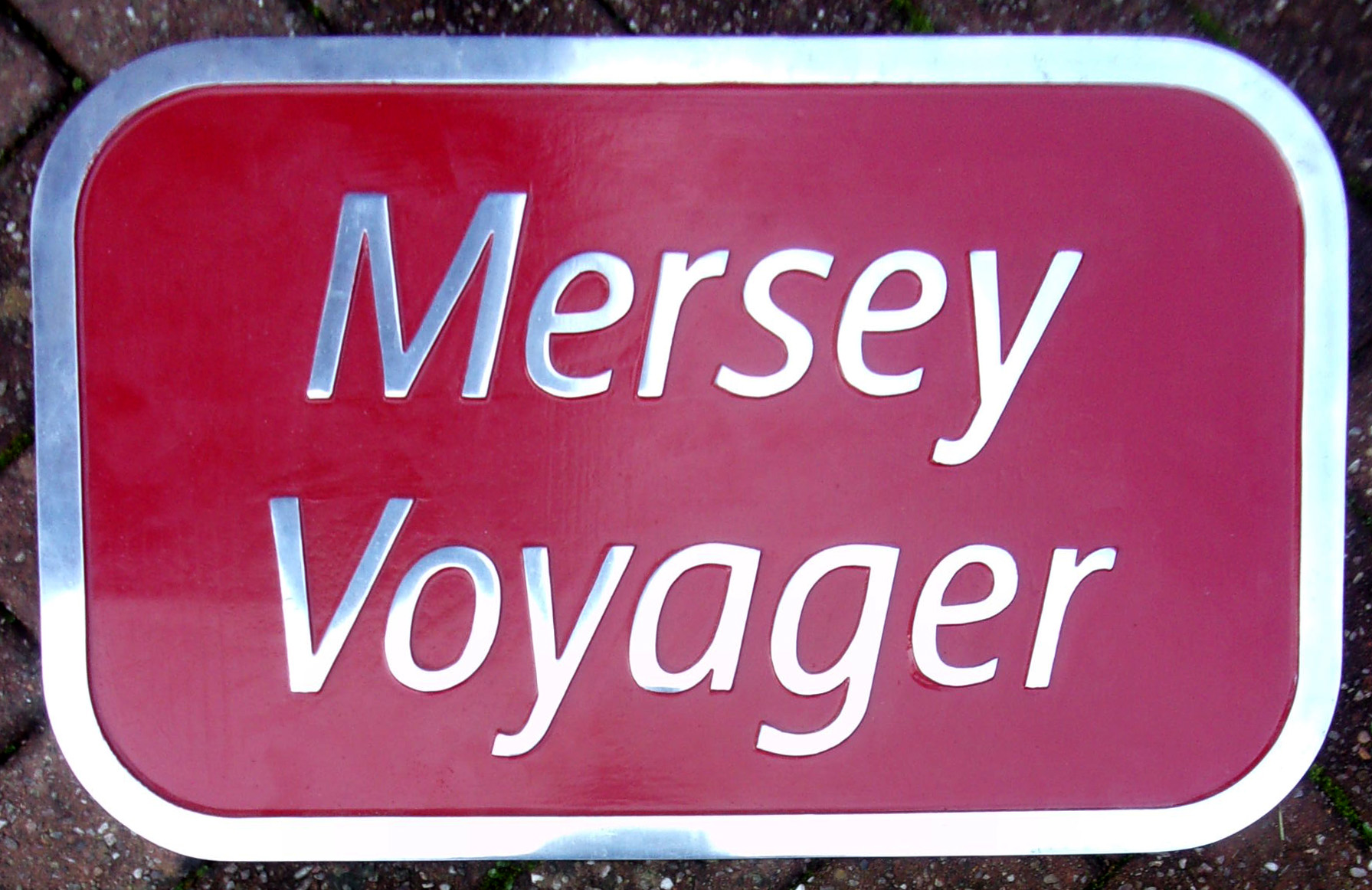 Nameplate "MERSEY VOYAGER" third uncarried plate from Voyager 220 019. Mint condition. 24 1/2" x 15". Polished, cast aluminium.