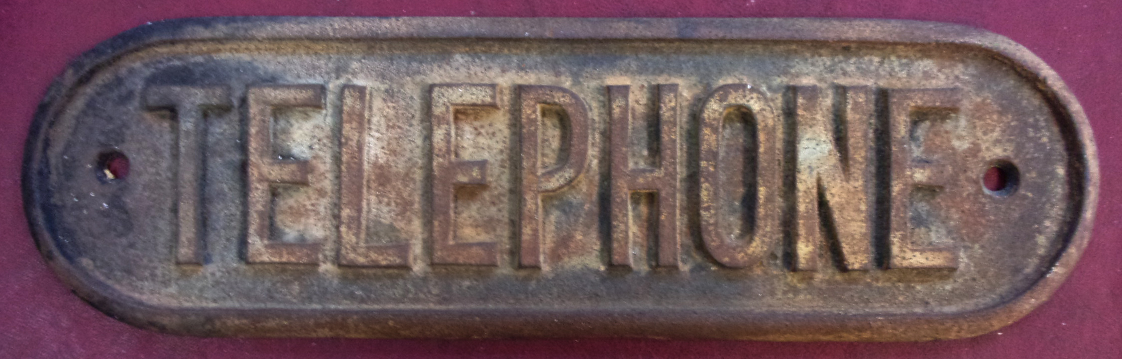 Great Northern pattern cast iron Door Plate "TELEPHONE" face void of paint, ex door back. Sound condition. 11 3/4" x 3 1/2".