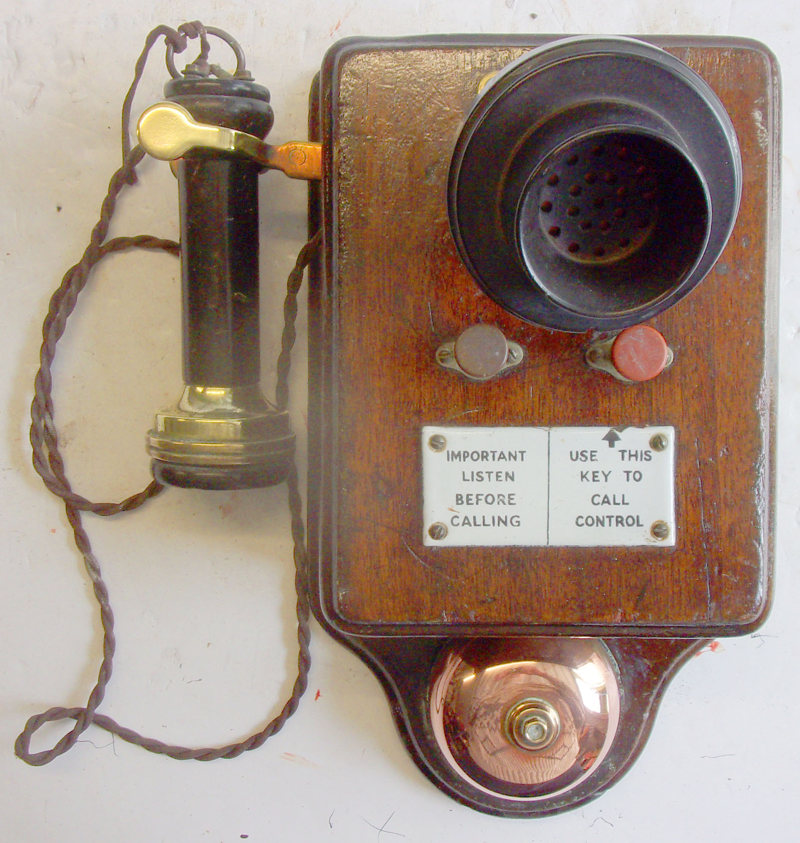 Signal Box Telephone early 20th century. Wall mounted phone, with its original unusual ear piece an flex.