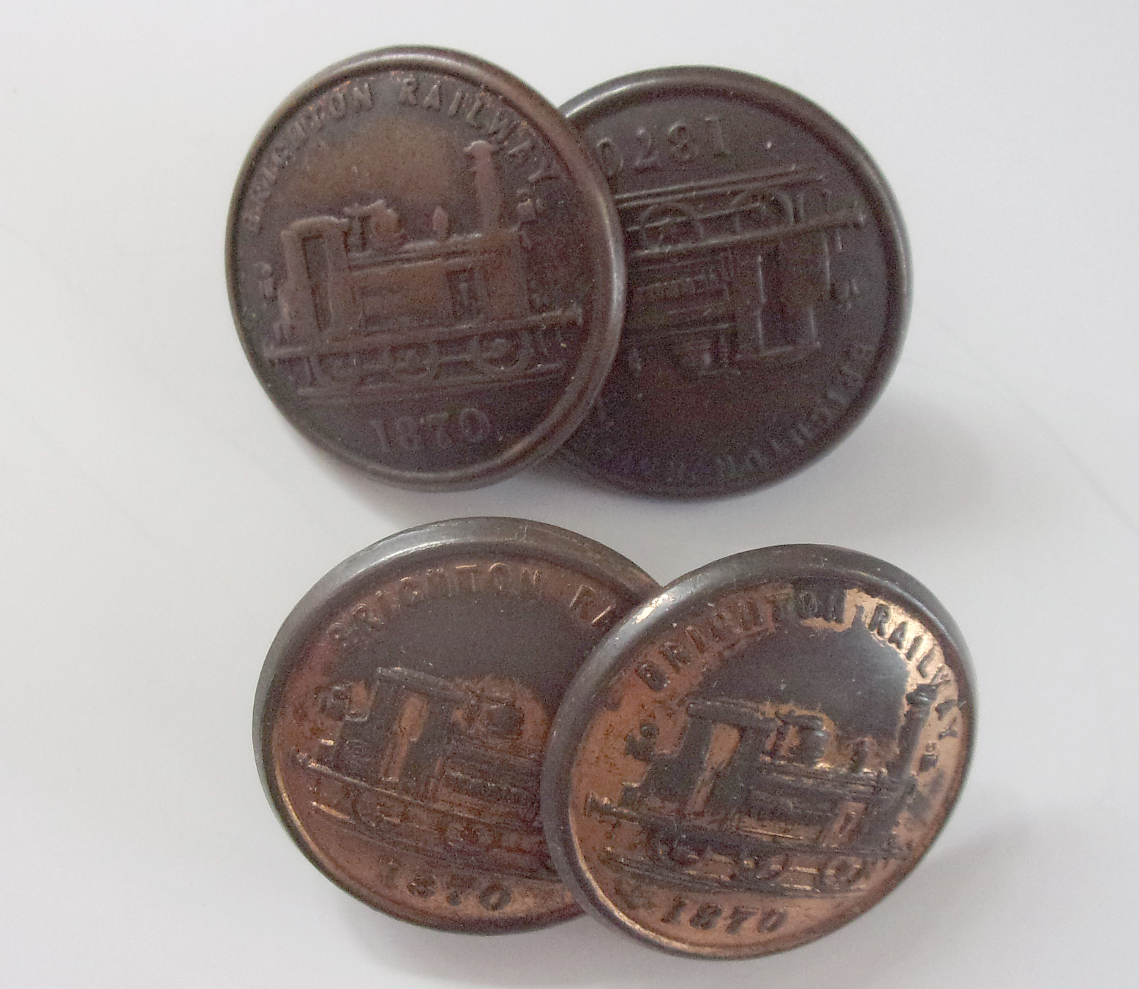 A pair of Brighton Railway Tunic Button, brass marked extra high quality on the underside. Super condition. Rare buttons.