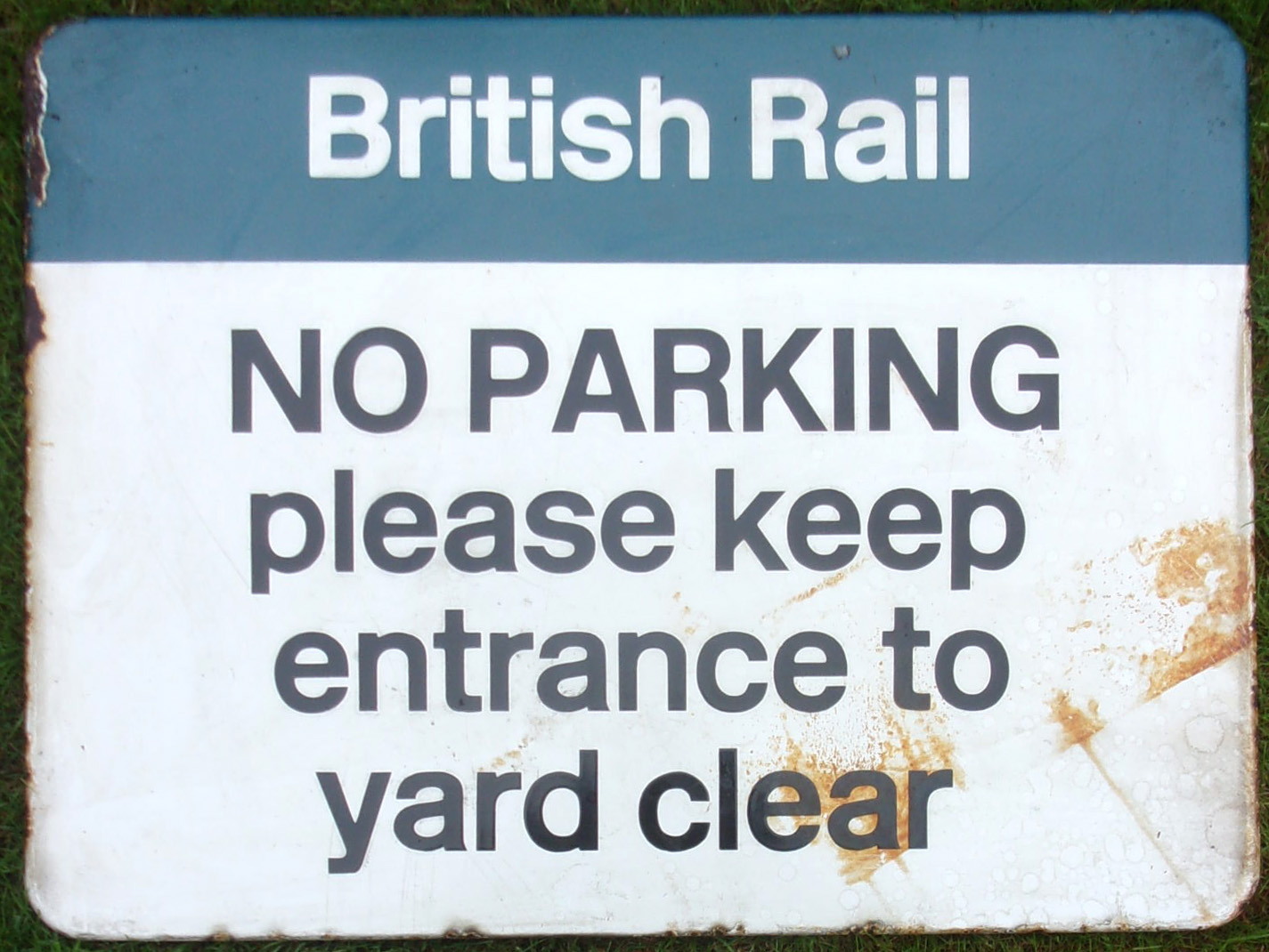 Enamel Sign "NO PARKING, PLEASE KEEP ENTRANCE TO YARD CLEAR". (BR) FF 24" x 18"