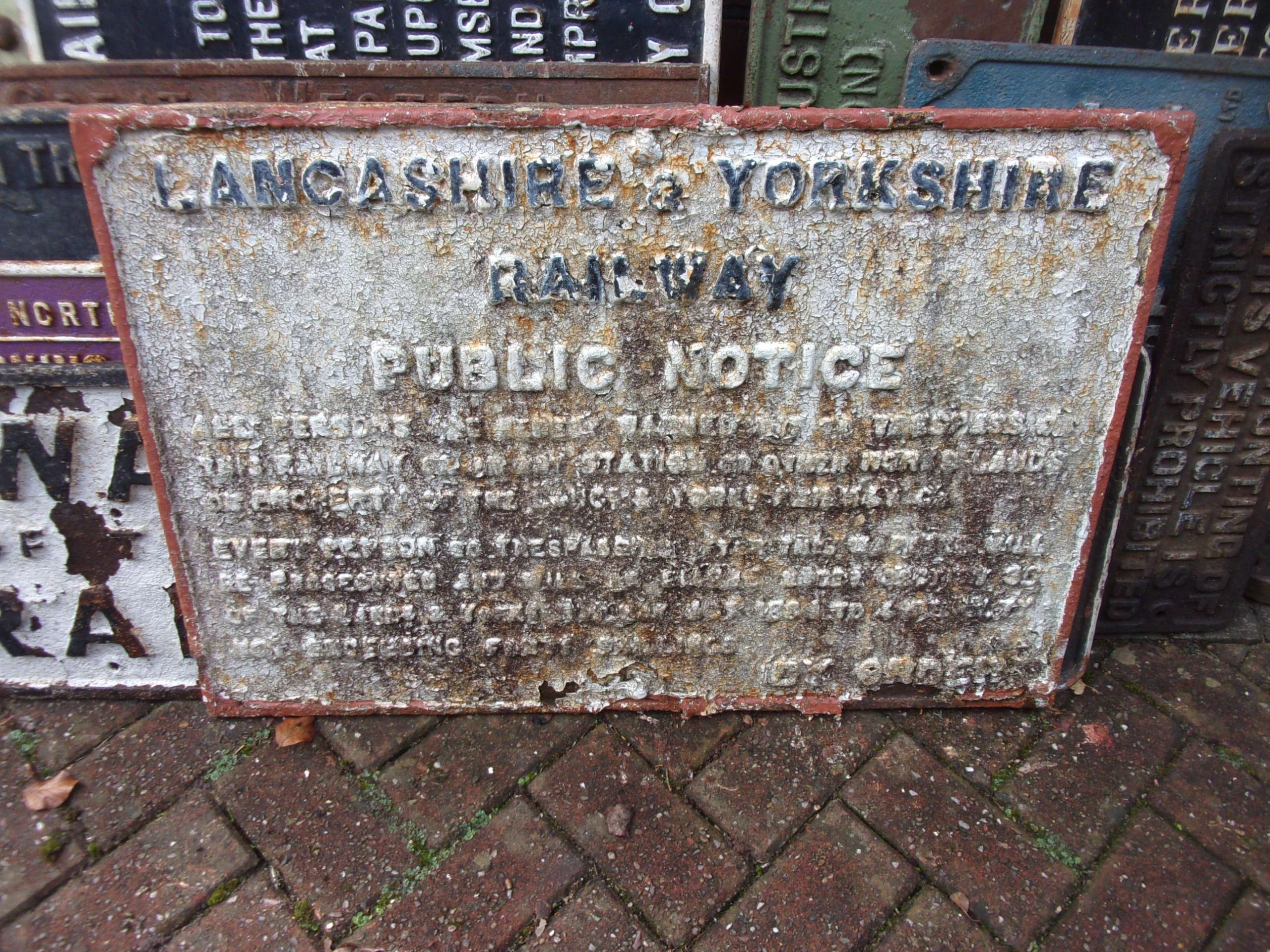 Cast iron sign "Lancashire & Yorkshire Railway Public Notice" ref to Trespass. 32 1/2" x 22 1/2".