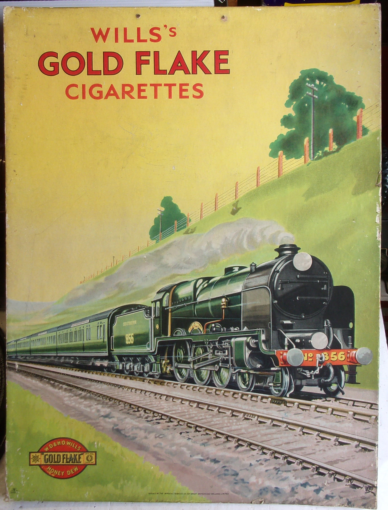 Advertising sign, probably from Station kiosk, Newsagent and Tobacconist. Good colour, mounted on heavy card. 15" x 20".