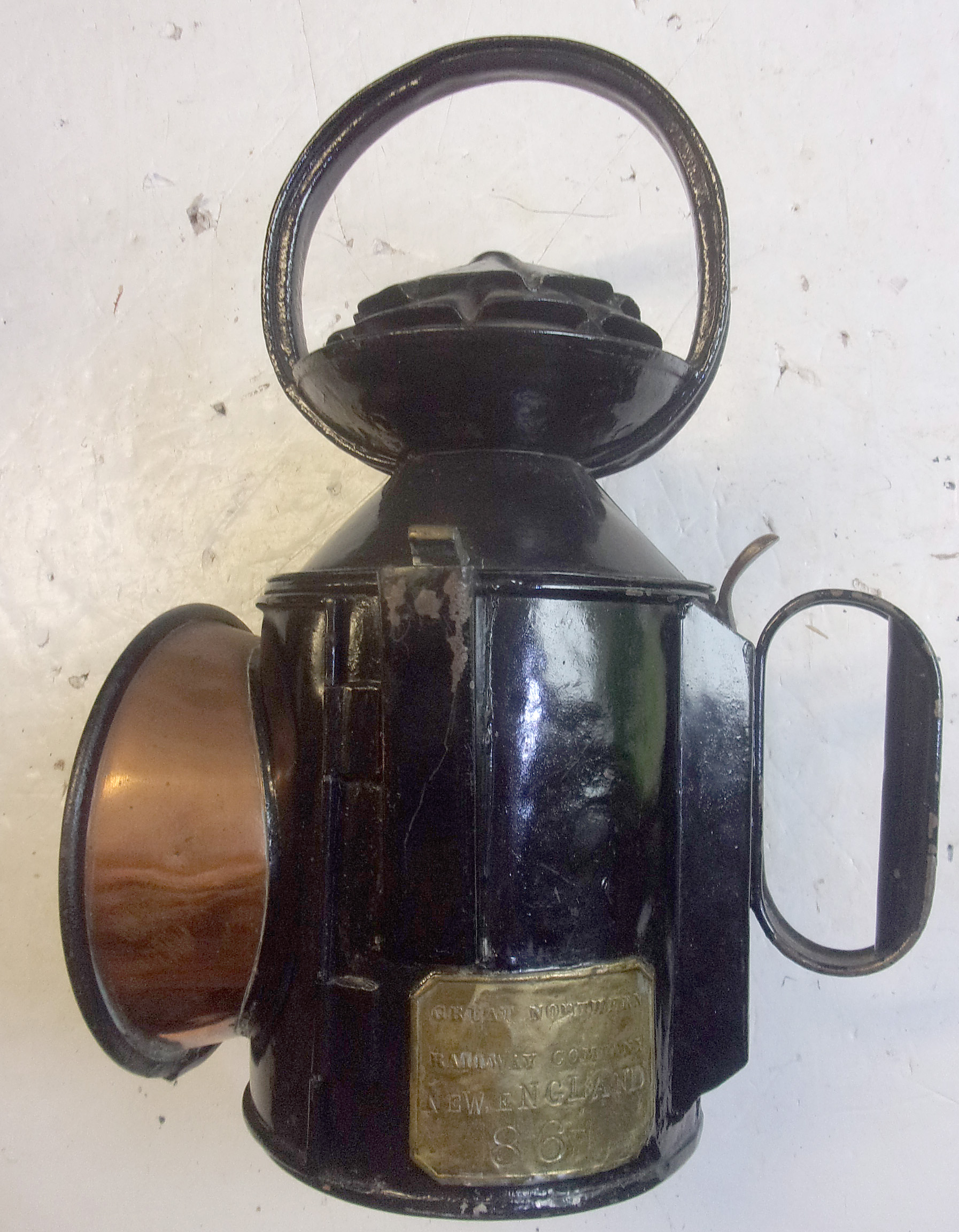 GNR 4 aspect Handlamp, brass plated "NEW ENGLAND", complete with correct vessel, burner and all glasses. Very nice lamp from the ECML.